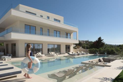 Pigianos Kampos Villa | Calòre Villas, Close to Beach, Gym, Wellness & Cinema, By ThinkVilla