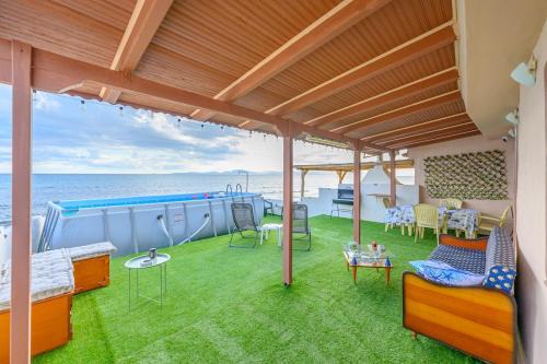 Arcoudi House | Ionion Paradise Beachfront Home with Private Pool