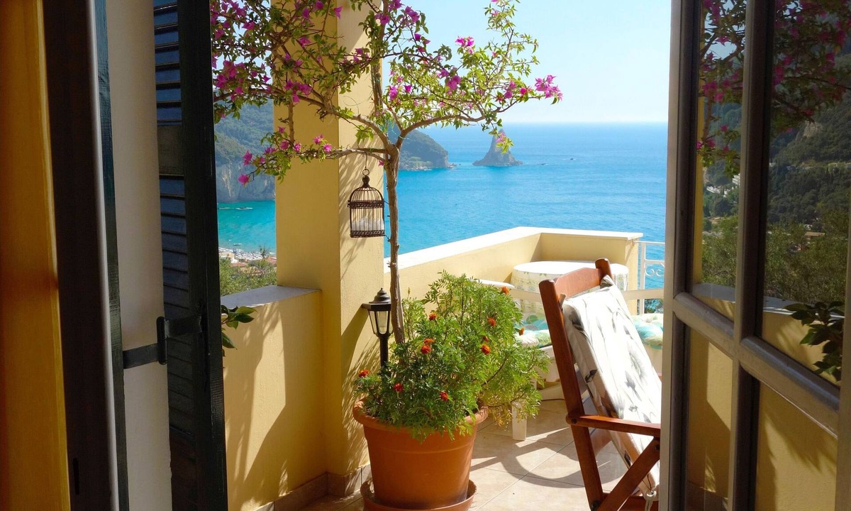 Agios Gordios Apartment | Natalia Loft Apartment C with panoramic sea views of Agios Gordios bay