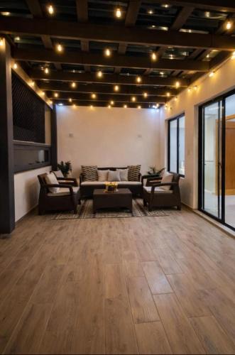 Llanos de Gurabo I Apartment | Spacious 4BR Penthouse Patio Perfect for Groups