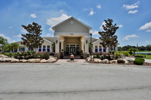 Trafalgar Village House | Updated retreat with pool access, W/D, AC, & patio - close to Disney Parks