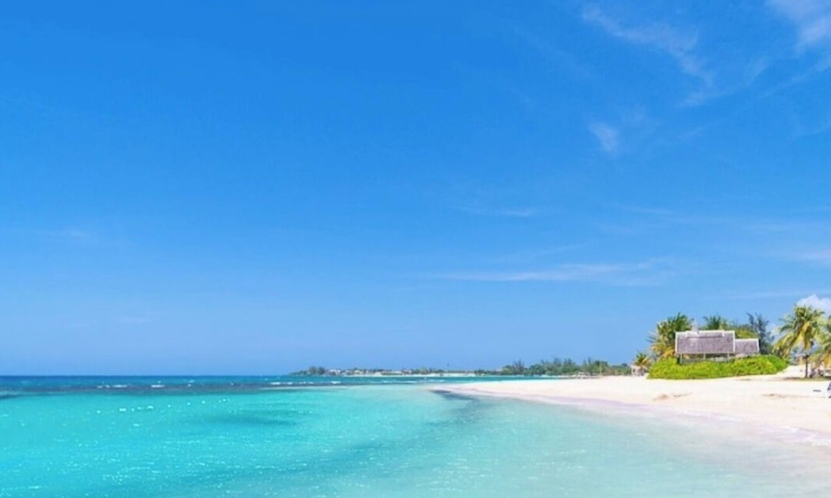 Stewart Town Resort | Welcome to Ocean's Tropical Escape! Beach front, beach access 1-bedroom, 4 bed.