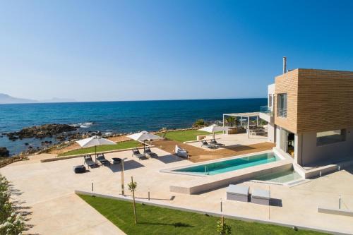 Filaki Villa | Your Private Retreat by the beach, with Heated Pool, by ThinkVilla
