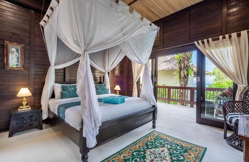 Candi Dasa Apartment | 1BR Beachfront Room with Balcony | The Village of Angels Resort