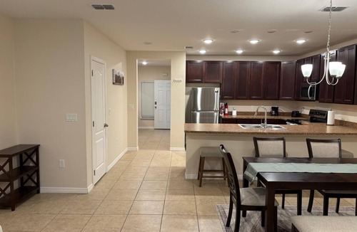 Kissimmee House | 3BR Townhome Near Disney - Limited-Time Deal! Gated Community, Pool. Gym & more.