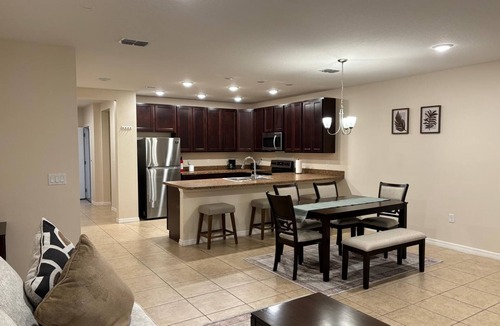 Kissimmee House | 3BR Townhome Near Disney - Limited-Time Deal! Gated Community, Pool. Gym & more.