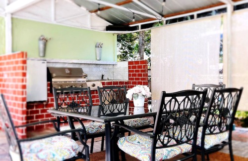 Camellia Gardens House | 4BR/2.5BTH Saltwater Pool home with Outdoor Kitchen and Fruit Trees