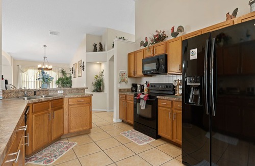 Liberty Village Villa | 4BR/3Bath Home, pool/spa, game room, lake view. Closer to ALL ATTRACTIONS