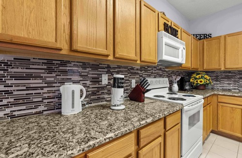 Windwood Bay House | 4BR retreat w/screened pool & spa