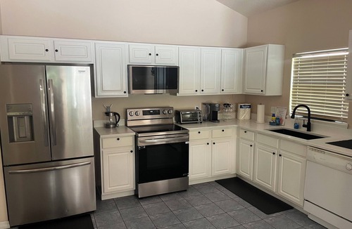 Sandy Ridge House | 5bd 4bth 20 min to Disney FREE Heated POOL & Spa. 2 Master suites.