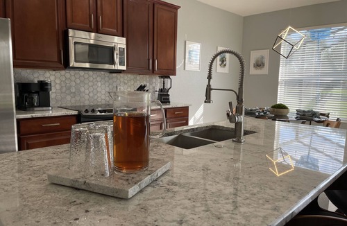 Windsor Hills Villa | 5BR/5BA ALL BABY GEAR, RESORT DUALING WATERSLIDES, 85" TV,