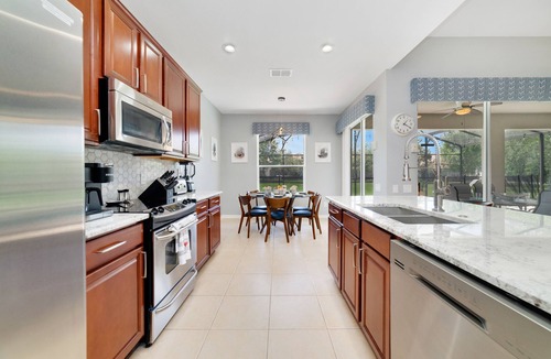 Windsor Hills Villa | 5BR/5BA ALL BABY GEAR, RESORT DUALING WATERSLIDES, 85" TV,