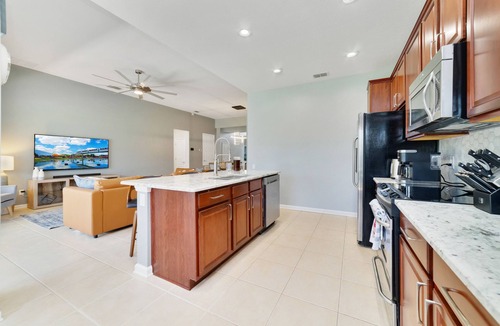 Windsor Hills Villa | 5BR/5BA ALL BABY GEAR, RESORT DUALING WATERSLIDES, 85" TV,