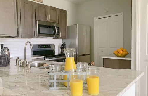 West Kissimmee Condo | Beautiful Lakeside Penthouse Award Winning Resort Just Minutes to Disney!