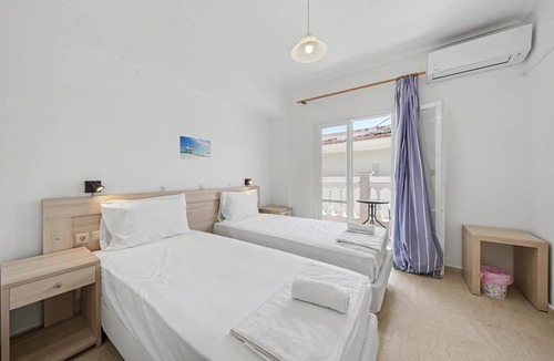 Kavos Bed & Breakfast | Bed and Breakfast 'The Kavos Sandy Inn-Double Room' with Shared Pool, Wi-Fi and Air Conditioning