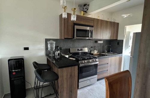 Punal Apartment | Charming Santiago Haven A Serene Space in the City 10 mins from STI Airport