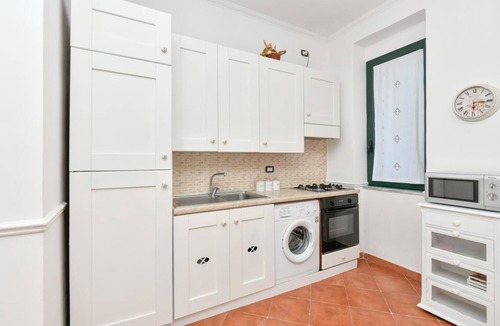 Santa Maria di Castellabate Villa | Coratina Apartment with private patio, in the garden and near the pool