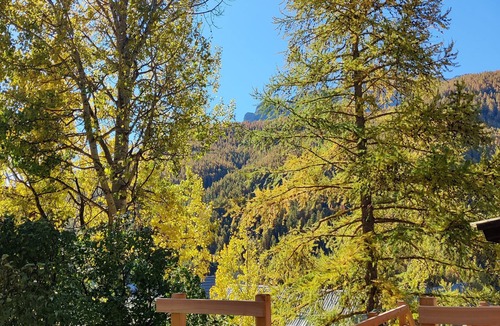 Molines-en-Queyras Cottage | Colorful, self-contained Père Castor apartment in the center of Molines