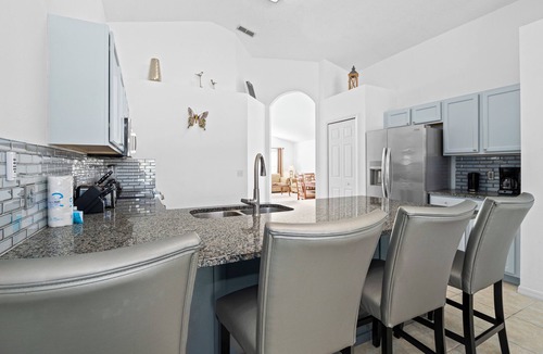 Haines City Villa | Disney,Golf. Villa 4 Bedroom 3 Bath 2 Master 2 lounges. Pool overlooks a Fairway