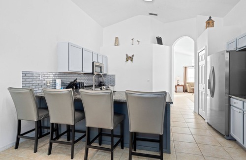 Haines City Villa | Disney,Golf. Villa 4 Bedroom 3 Bath 2 Master 2 lounges. Pool overlooks a Fairway