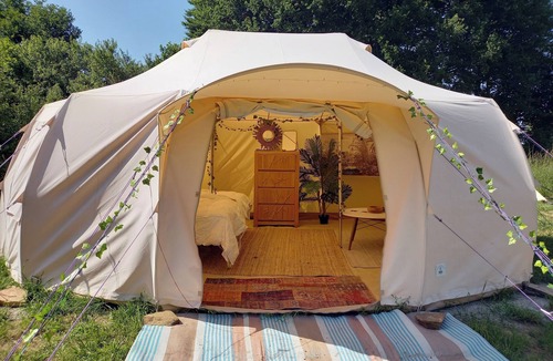 Saint-Palais RV Rental | Experience an unusual adventure in our Jungle Tent with vintage military truck