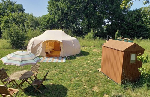 Saint-Palais RV Rental | Experience an unusual adventure in our Jungle Tent with vintage military truck