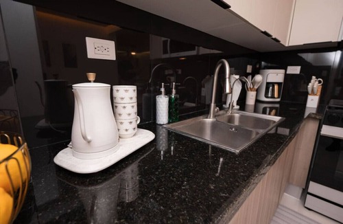 Punal Apartment | Family Rooftop by Airport Pool-Gym-Cinema-Security