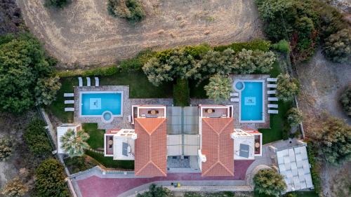 Xiro Chorio Villa | Family Villas Magic Media Resort with Private Heated Pool, Playground, Basketball & Game Room