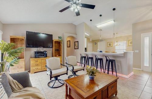 Crescent Lakes House | Inviting pool home with tranquil pond view near theme parks & attractions