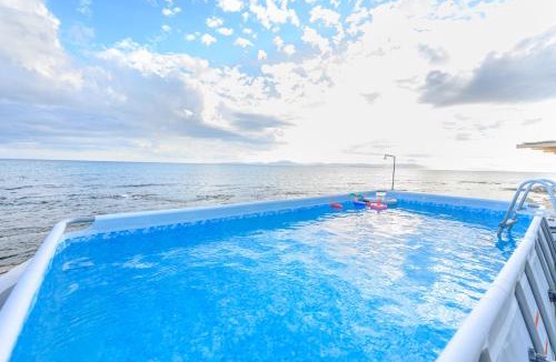 Arcoudi House | Ionion Paradise Beachfront Home with Private Pool
