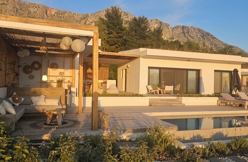 Paleros Villa | Luxury villa, large terrace, lounge area, pool, jacuzzi + magnificent sea view.