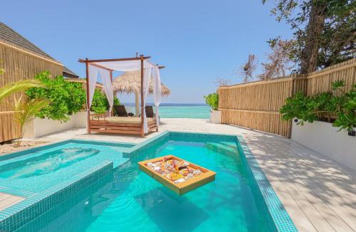 Kuda Bandos Resort | Malahini Kuda Bandos Special Offer Begin your island escape with ease airport pick up and return by shared speedboat at just USD 50 per person stays stay untill end August
