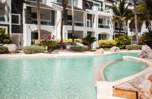 Dominicus Apartment | Minimalist and modern apartment meters away from the beach, 5 pools, garden.