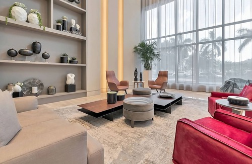Doral Hotel | Modern 3BR City View Residence with Balcony and Luxury Amenities Near Downtown