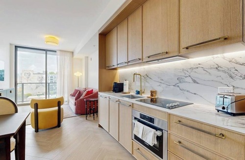 Wynwood Art District Condo | Modern condo with skyline views, rooftop pool & private balcony