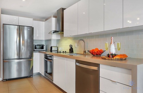 Town Square Apartment | Modern Luxury, City View, Pool, Central Location