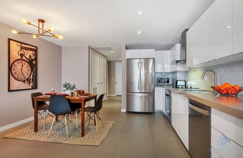 Town Square Apartment | Modern Luxury, City View, Pool, Central Location
