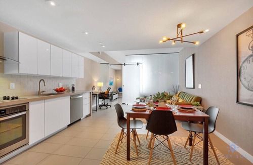 Town Square Apartment | Modern Luxury, City View, Pool, Central Location