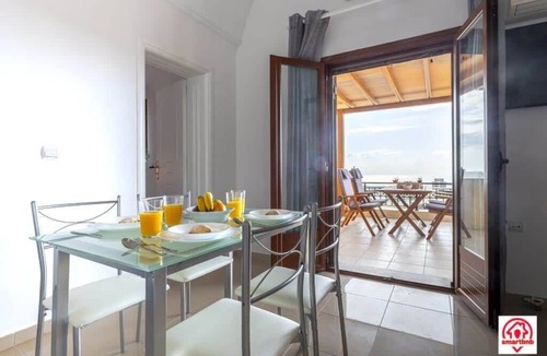 Megalochori Apartment | Modern Naya Escape in Santorini with Captivating Sea Views