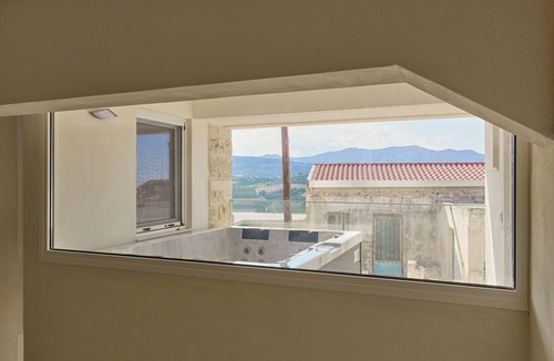 Myrtia Cottage | Myrtia Cave Maisonette with hot tub by Chic Greek Villas