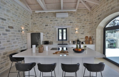 Atsipópoulon Villa | new natural stone villa with large pool and great sea views