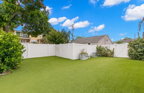 Courier City - Oscawana Apartment | NEW SoHo Sanctuary - Gorgeous Apartment Steps to S Howard Ave with Fenced Yard