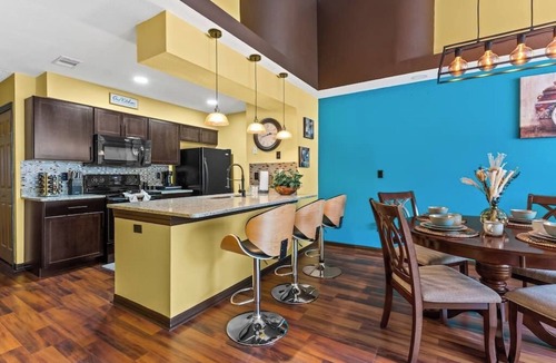 Royal Palm Bay Apartment | Orlando/Kissimmee Polynesian Inspired Oasis with Pool, Minutes from Disney.