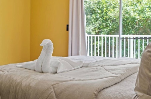 Royal Palm Bay Apartment | Orlando/Kissimmee Polynesian Inspired Oasis with Pool, Minutes from Disney.