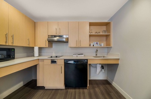 Florida Central Atlantic Coast Hotel | Perfect for Groups! Spacious Unit with Full Kitchen, Outdoor Pool, Pets Allowed!