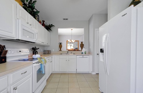 Windsor Hills Villa | *Pool home with private theater 10 mins to Disney*
