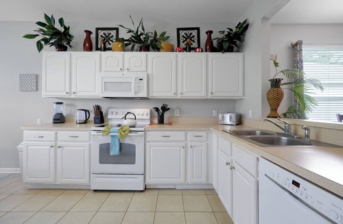 Windsor Hills Villa | *Pool home with private theater 10 mins to Disney*