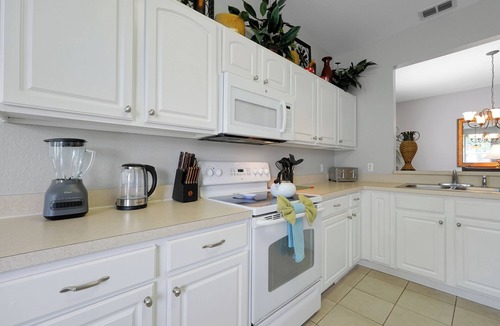 Windsor Hills Villa | *Pool home with private theater 10 mins to Disney*