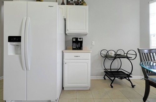 Windsor Hills Villa | *Pool home with private theater 10 mins to Disney*