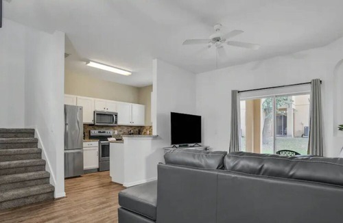 Regal Palms Villa | Resort townhome with patio, on-site pool and hot tub, gym, pool table, AC & W/D